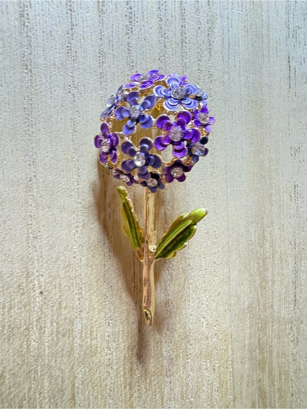 Purple Floral Cluster Brooch with Gold Stem and Green Leaves
